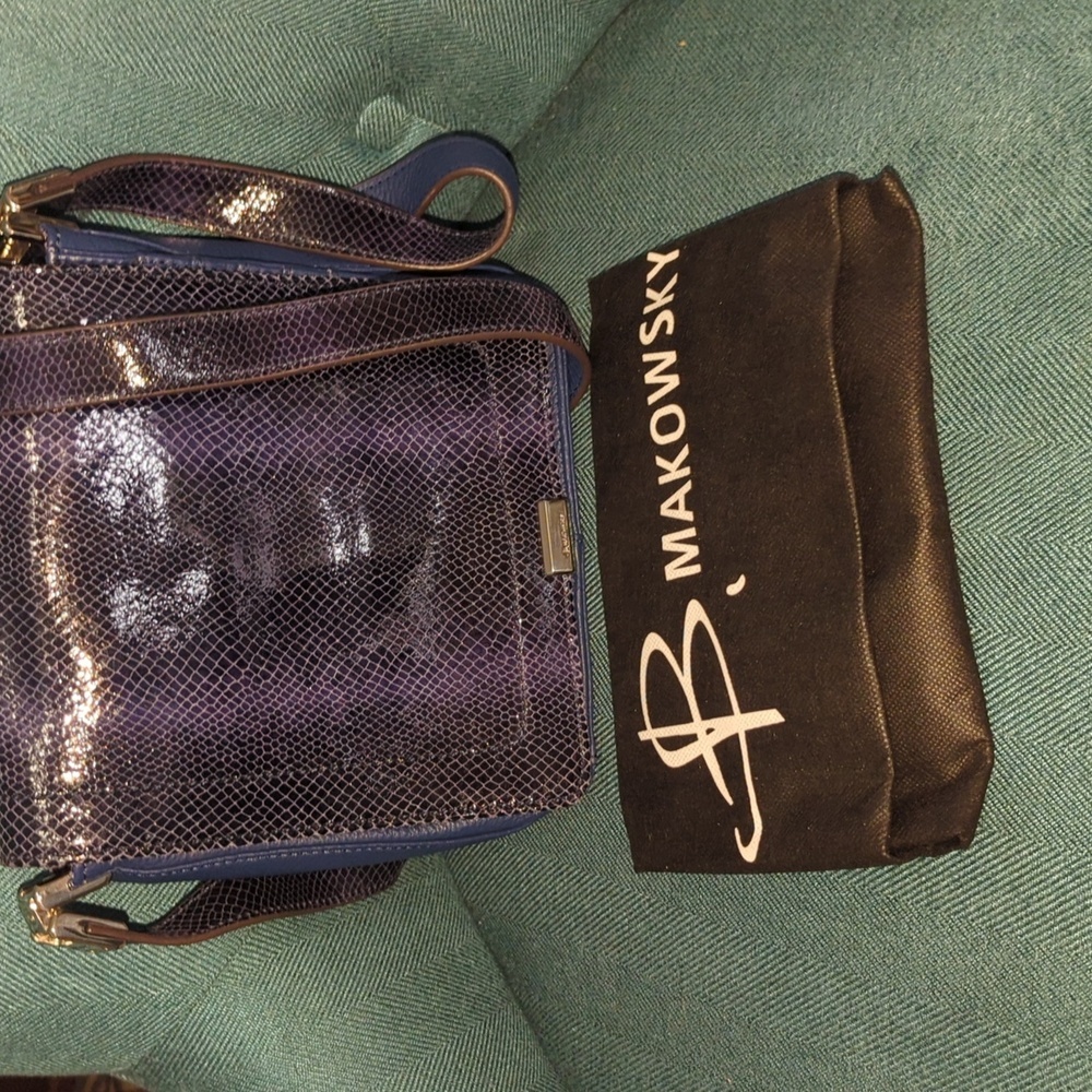 B. Makowsky Blue leather crossbody with a Dusty